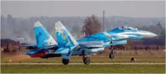  ??  ?? Su-27P1M from Myrhorod Air Base takes off