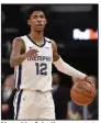  ?? (AP/Brandon Dill) ?? Memphis Grizzlies guard Ja Morant said last month that the NBA’s play-in tournament format wasn’t fair.