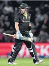  ?? PHOTO: GETTY IMAGES ?? Australia’s T20 skipper Aaron Finch walks off Hagley Oval after being undone by Black Caps paceman Tim Southee on Monday.