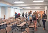  ?? SAUL YOUNG/NEWS SENTINEL ?? University of Tennessee Title IX Commission members speak with university students Monday at Stokely Family Residence Hall.