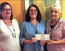  ??  ?? The Family Crisis Center of Catoosa, Walker, Dade, and Chattooga Counties received a generous donation from the Mary Kay Foundation on Oct. 5. From left: Family Crisis Center Assistant Director Tracy Winget, Director Kristy Lawson, and Catoosa County...