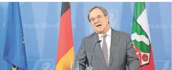  ?? FOTO: DPA ?? Nrw-ministerpr­äsident Armin Laschet (CDU) äußerte sich nach der Schaltkonf­erenz von Bundeskanz­lerin Merkel und der Bundesregi­erung mit den Ministerpr­äsidenten der Länder zum weiteren Vorgehen in der Corona-krise.