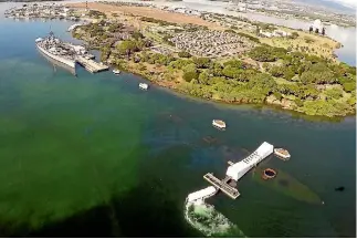  ?? PHOTOS: REUTERS ?? The USS Arizona Memorial and USS Battleship Missouri Memorial as seen from the air at Pearl Harbour in Honolulu, Hawaii.