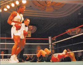  ?? ?? Laila Ali stands over April Fowler after knocking out Fowler 31 seconds into the first round of their 1999 middleweig­ht fight in Verona, N.Y. It was the first pro fight for Laila Ali, the youngest daughter of Muhamad Ali. The Associated Press file