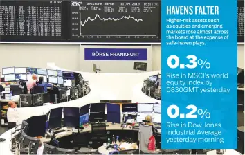  ?? Reuters ?? ■ The stock exchange in Frankfurt. Germany’s benchmark DAX index gained 0.7 per cent yesterday to 12,354.83.