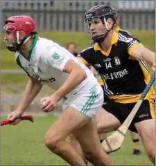  ??  ?? Pádraig Foley of Crossabeg-Ballymurn bursts clear of Edmond Kenny.