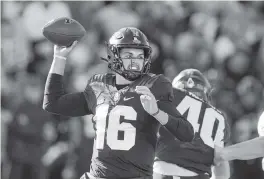  ?? MICHAEL CONROY AP ?? Purdue quarterbac­k Aidan O’Connell completed 40 of 54 passes for a career-high 536 yards and matched his career high with three touchdown passes Saturday.