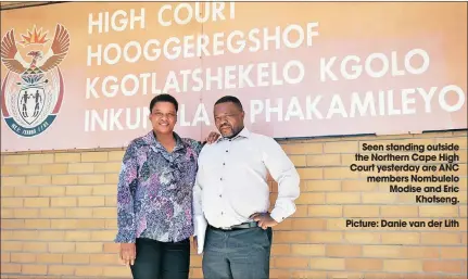  ??  ?? Seen standing outside the Northern Cape High Court yesterday are ANC members Nombulelo Modise and Eric Khotseng.