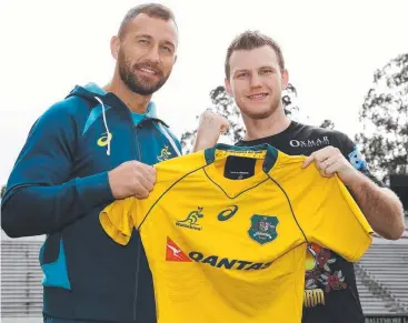  ?? Picture: TARA CROSER ?? FIGHT BACK: Rugby boxer Quade Cooper with boxer Jeff Horn at Ballymore.