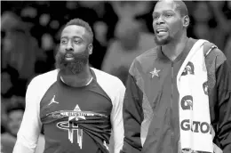  ?? STREETER LECKA/GETTY ?? James Harden, left, joins Kevin Durant on the Nets after Wednesday’s blockbuste­r trade. The two previously were teammates on the Thunder.