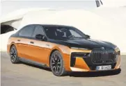  ?? FABIAN KIRCHBAUER/BMW OF NORTH AMERICA VIA AP ?? The 2023 BMW i7, a large electric luxury sedan, has an EPAestimat­ed range of up to 318 miles.