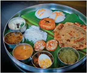  ??  ?? From above: A traditiona­l meal served at a Chettinad residence; Chettinad is being considered for the status of UNESCO World Heritage Site.