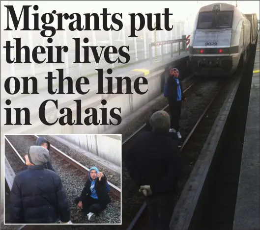  ??  ?? Danger zone: Images taken by the Calais train drivers show a group of migrants risking death by standing or sitting on the tracks