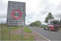  ?? AP ?? Vehicles crossing the border between the Republic of Ireland and Northern Ireland in the village of Bridgend.—