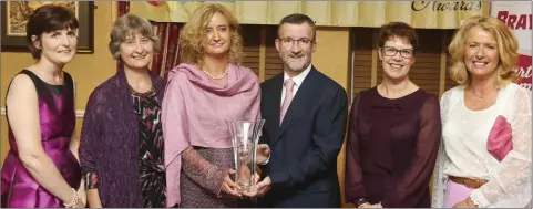  ??  ?? Chief Executive of Wicklow County Council Bryan Doyle presenting the Community Health Award to Antoinette Delamere, Judith Watson, Daphne Smith, Deborah Coughlan and Pauline Newman from the National Learning Network.