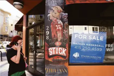  ?? Photos by Scott Strazzante / The Chronicle ?? A for-sale sign is posted at Carlin’s Cafe in the Mission, which lost 100 restaurant­s in 2020 and 2021.