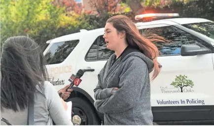  ?? TOM KISKEN/USA TODAY NETWORK ?? Taylor Young of Moorpark was at the Borderline Bar &amp; Grill when the shooting happened Wednesday night. She has tried to cope with her grief by helping people affected by the fire evacuate.