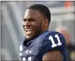  ?? ASSOCIATED PRESS FILE PHOTO ?? Penn State linebacker Micah Parsons (11) laughs on the bench in the fourth quarter of a 2019 game against Idaho in State College, Pa.