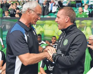  ??  ?? Claudio Ranieri and Brendan Rodgers greet each other before their ICC clash.