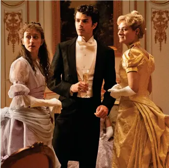  ?? ?? ARM’S LENGTH: Taissa Farmiga, Harry Richardson and Louisa Jacobson in The Gilded Age