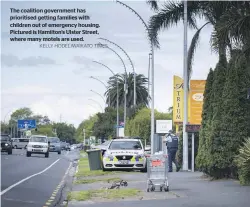  ?? . KELLY HODEL/WAIKATO TIMES ?? The coalition government has prioritise­d getting families with children out of emergency housing. Pictured is Hamilton’s Ulster Street, where many motels are used.