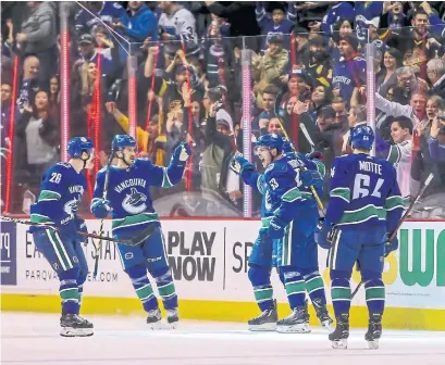  ?? BEN NELMS AP ?? Canucks officials are looking forward to when fans of Seattle's new NHL franchise will trek northas part of a healthy rivalry.