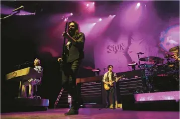  ?? CHRIS SWEDA /CHICAGO TRIBUNE PHOTOS ?? Styx performs “Lady” at Hollywood Casino Amphitheat­re in Tinley Park on June 4.