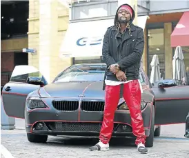  ?? Picture: MOEKETSI MOTICOE ?? RAPPER WRAPPED: Buffalo Souljah with his customised car that is based on the movie ’Tron’