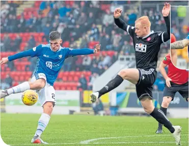  ??  ?? Hamilton’s Ziggy Gordon can’t stop Ross Callachan having a shot for St Johnstone, which is saved before Tony Watt (not pictured) scores