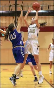  ?? PETE BANNAN — DIGITAL FIRST MEDIA ?? Bishop Shanahan’s Katherine Greenhut (40) puts a shot up as Lower Dauphin’s Pauliina Malinen (43) defends Saturday at Harriton.