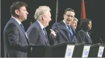  ?? THE CANADIAN PRESS ?? Conservati­ve leadership candidates, from left, Roman Baber, Jean Charest, Pierre Poilievre, Scott Aitchison and Leslyn Lewis take part in an unofficial debate in Ottawa last week.