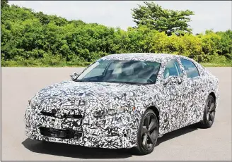  ??  ?? This photo provided by American Honda Motor Co, Inc shows the next generation Honda Accord. Honda says its Accord midsize car will be offered only with four-cylinder or gas-electric hybrid engines when an all-new version comes out later in 2017. The...