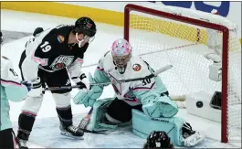  ?? MARTA LAVANDIER - THE ASSOCIATED PRESS ?? Atlantic Division’s Matthew Tkachuk, of the Florida Panthers scores against Metropolit­an Divisions’ goaltender Ilya Sorokin, of the New York Islanders during the NHL All Star hockey game, Saturday in Sunrise, Fla.