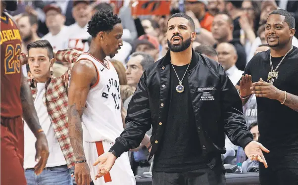  ??  ?? Toronto native and Raptors fan Drake got into a verbal altercatio­n with Cavaliers center Kendrick Perkins on Tuesday. JOHN E. SOKOLOWSKI/USA TODAY SPORTS