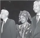  ?? GLEANER FILE PHOTO ?? African National Congress leader Nelson Mandela (right) and his wife, Winnie, in Jamaica on Wednesday, July 24, 1991. At left is Prime Minister Michael Manley.