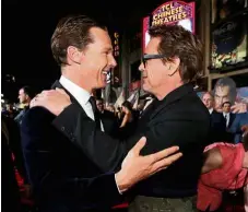  ??  ?? Close pals: Cumberbatc­h (left) greeting fellow actor Robert Downey Jr at the premiere of ‘Doctor Strange’ in Hollywood, California. — Reuters