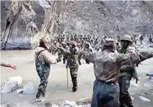  ?? —AFP ?? Deadly clashes:
A screengrab from video footage in June last year showing Chinese (foreground) and Indian soldiers in the Galwan Valley in the Himalayas.