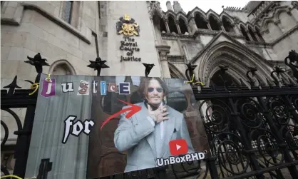  ??  ?? A poster on the railing of the Royal Courts of Justice in London, where a ruling on Johnny Depp’s applicatio­n to the court of appeal was taking place. Photograph: Yui Mok/PA