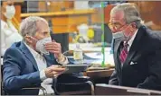  ?? Al Seib Los Angeles Times ?? DURST, left, speaks with defense attorney Dick DeGuerin on Tuesday during his murder trial.