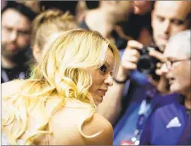  ?? Kamil Zihnioglu EPA/Shuttersto­ck ?? STORMY DANIELS in Berlin last week. A judge ordered Daniels to pay President Trump’s legal fees in the case. Her attorney filed a notice of appeal Monday.