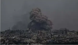 ?? ?? Smoke and explosions rise inside the Gaza Strip, as seen from southern Israel, Sunday, Sunday, March 17, 2024.