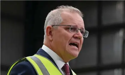  ?? Photograph: Mick Tsikas/AAP ?? Scott Morrison visits Star Scientific, a hydrogen research facility on the Central Coast, NSW. Australia is under pressure going into Joe Biden’s climate summit for lack of ambition on climate action.