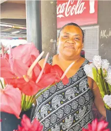  ?? Picture: RUSIATE VUNIREWA ?? Flower vendor Rigieta Takayawa at the Suva Municipal Market looks forward to IWD today where women’s contributi­on is recognised annually.