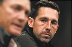  ?? Michael Macor / The Chronicle ?? 49ers GM John Lynch (left) and head coach Kyle Shanahan have a talented young quarterbac­k, but maybe not the one Shanahan had hoped to have.