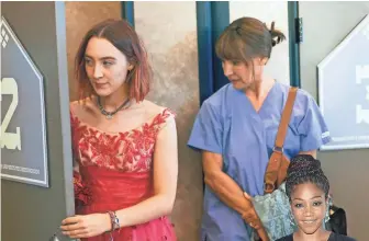  ?? MERIE WALLACE/A24 ?? Teenage Christine (Saoirse Ronan) doesn’t see eye to eye with her mother (Laurie Metcalf) in “Lady Bird.”
