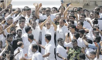  ?? Picture: Reuters ?? IN CHARGE. Sri Lanka’s president-elect Gotabaya Rajapaksa waves at his supporters as he leaves after the presidenti­al swearing-in ceremony in Anuradhapu­ra, Sri Lanka, on Monday.