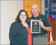  ??  ?? Left: District Attorney Leigh Patterson (left) with Investigat­or Steve Acker, winner of a Respect for Law award given to an employee in the DA’S office for the first time Monday. Right: Floyd County Prison Deputy Warden Frank Cronan (left) presented Correction­s Officer Cassandra Mayfield with a Respect for Law award at a joint luncheon of the local Exchange, Kiwanis, Lions and Noon Optimist clubs.