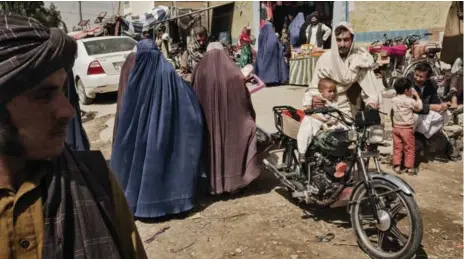  ?? ADAM FERGUSON/THE NEW YORK TIMES ?? A deep-rooted taboo against publicly naming women leads Afghan men to refer to their wives by terms such as “Mother of Children” or “My Weak One.”