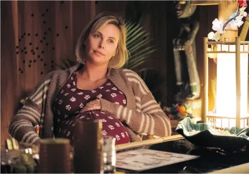  ?? KIMBERLY FRENCH / FOCUS FEATURES VIA THE ASSOCIATED PRESS ?? Charlize Theron, who portrays an exhausted new mother, in a scene from Tully.