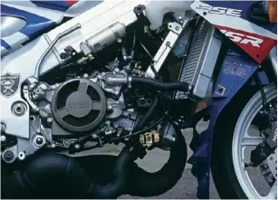  ?? ?? BELOW: Both this SE and the top-spec SP models’ engines differed from the standard NSR’s 90-degree V-twin by having a racebike-style dry clutch